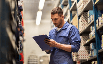 Maintenance worker reviews work order