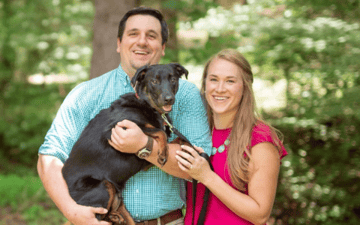 Derek with his wife and dog