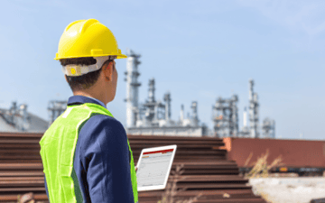 Maintenance planner looks over permits for his teams next job 