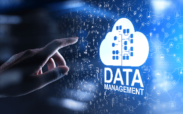 Hand reaching towards cloud data management 