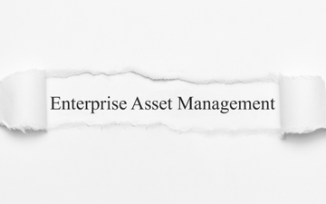 Enterprise asset management behind a ripped paper 